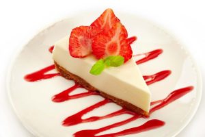 Strawberry cheesecake on a white plate